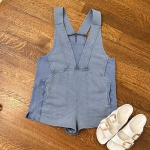 Blue romper. Knit, pockets. Size small